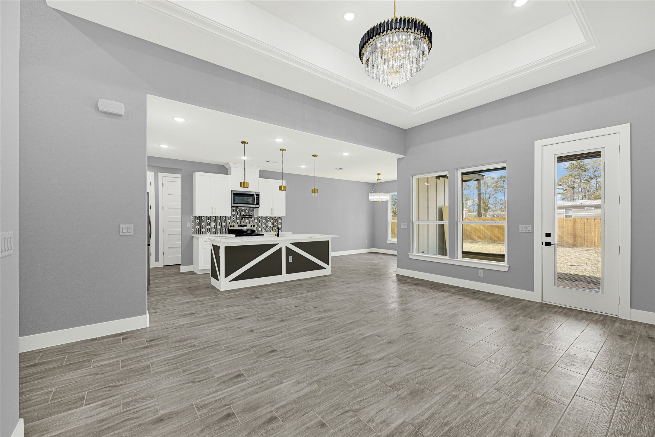515 Fairfax Lane Conroe, TX 77303 - Photo 9 of 26 a view of a livingroom with furniture wooden floor and window