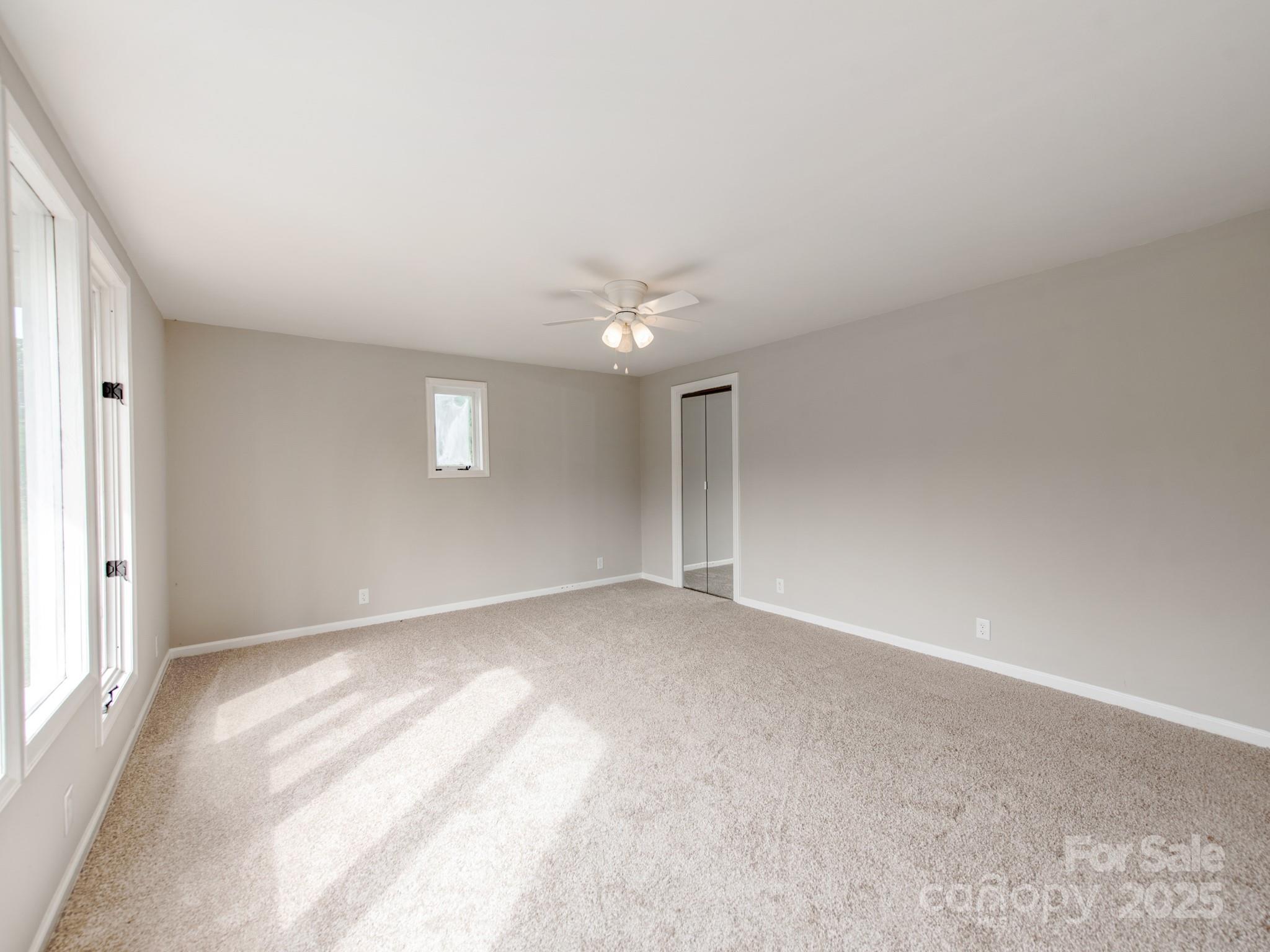 3607 Austin Road Monroe, NC 28112 - Photo 13 of 39 a view of an empty room with a window
