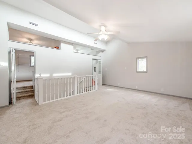 a view of a livingroom with a staircase