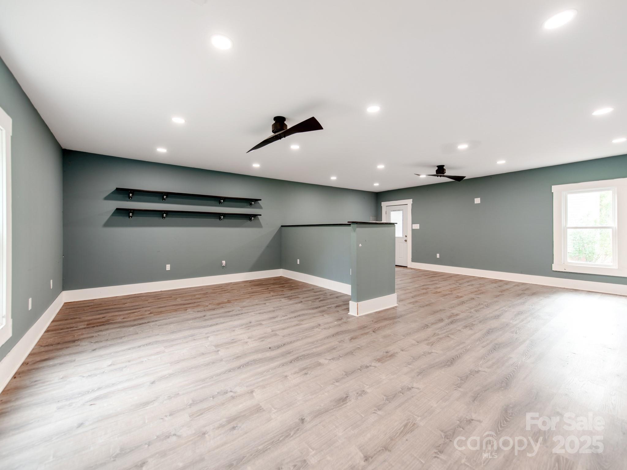 3607 Austin Road Monroe, NC 28112 - Photo 25 of 39 a view of empty room with wooden floor