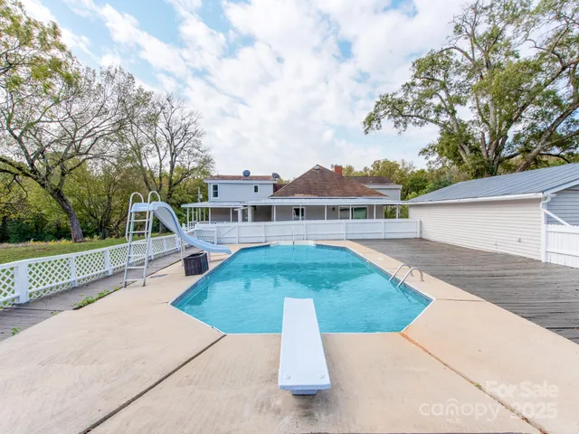 a view of a house with a big yard