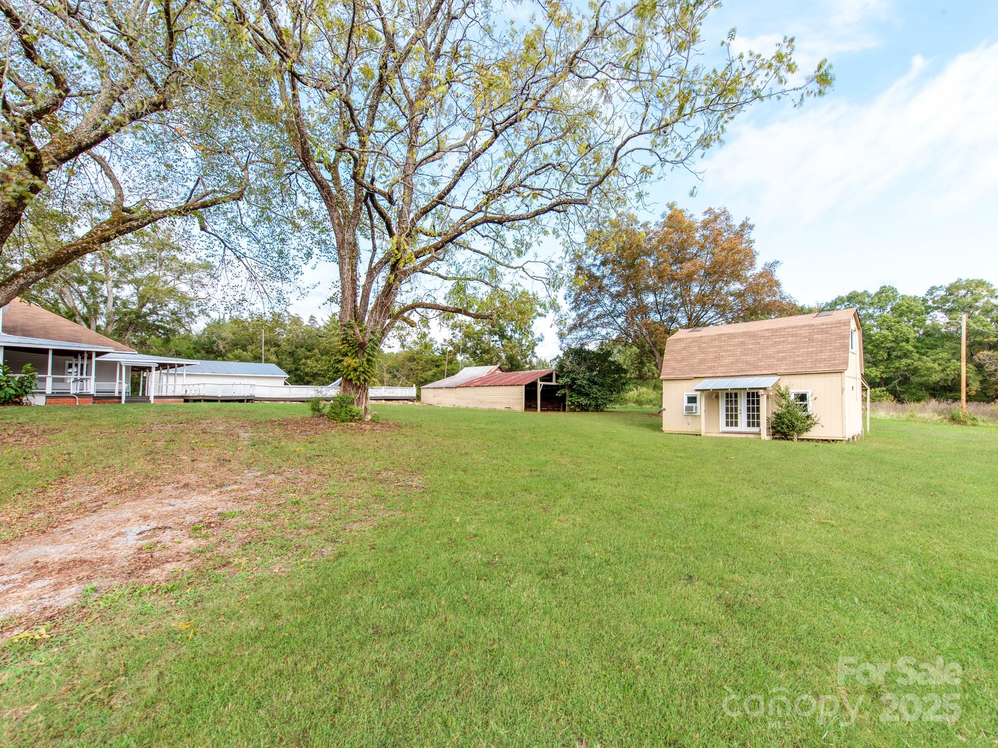 3607 Austin Road Monroe, NC 28112 - Photo 29 of 39 a view of a house with a big yard