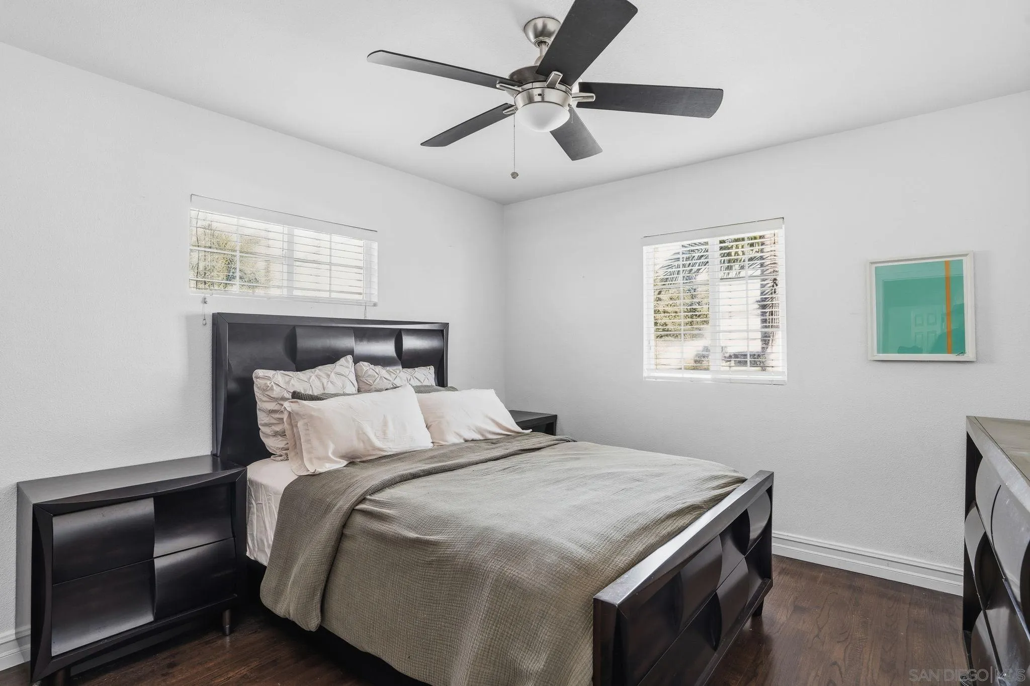 480 Orlando Street El Cajon, CA 92021 - Photo 18 of 25 a bedroom with a bed and a chandelier