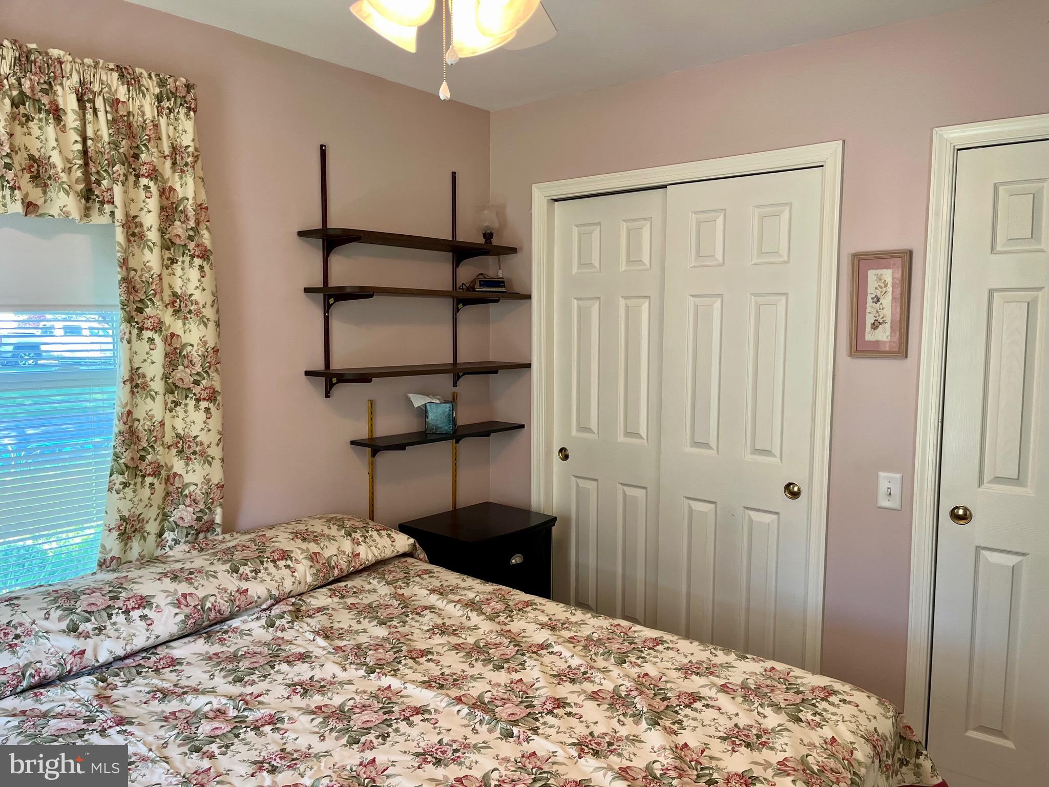870 Broadfield Drive Newark, DE 19713 - Photo 11 of 13 a bedroom with a bed and a window
