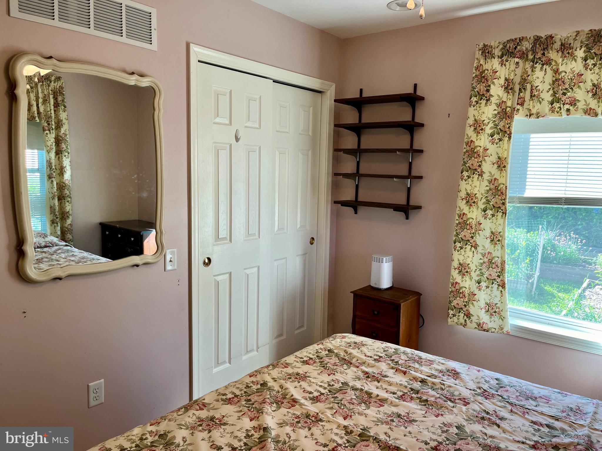 870 Broadfield Drive Newark, DE 19713 - Photo 12 of 13 a bedroom with a bed and a window