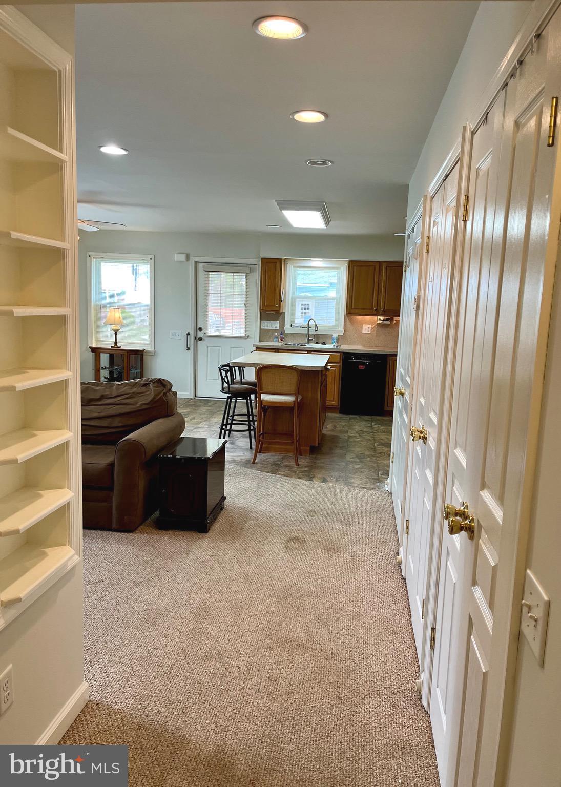 870 Broadfield Drive Newark, DE 19713 - Photo 6 of 13 a living room with furniture and a fireplace