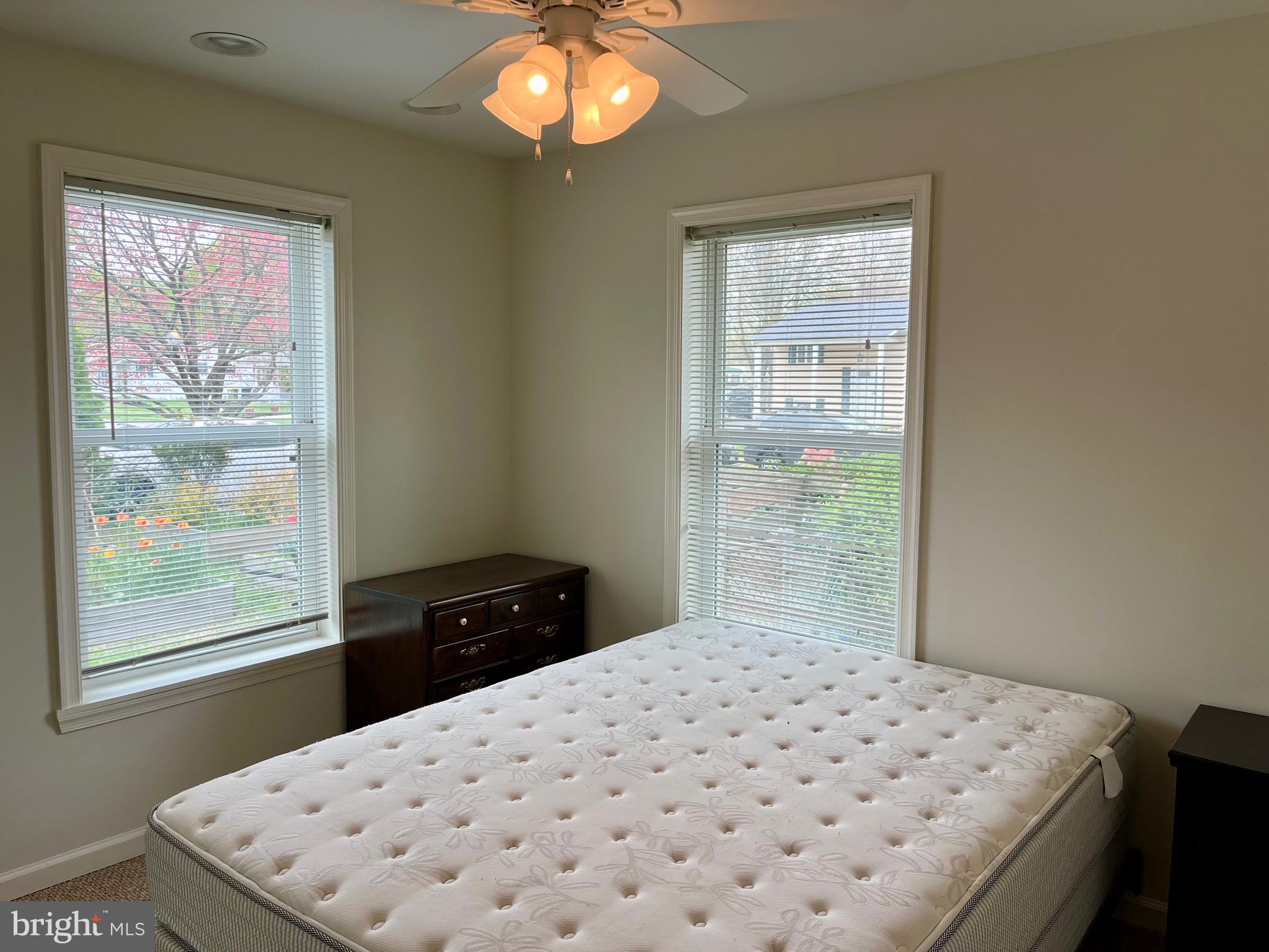 870 Broadfield Drive Newark, DE 19713 - Photo 9 of 13 a bedroom with a bed and a window