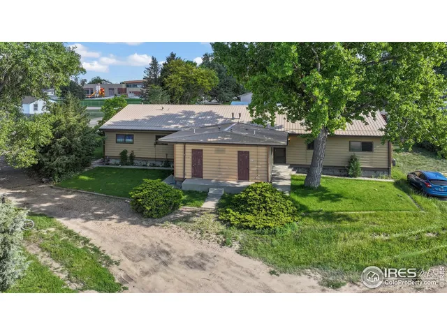 a black and white photo of a house