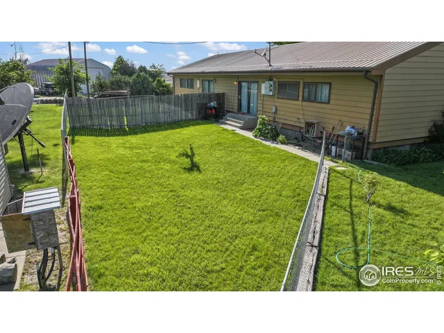 a view of a backyard with a garden