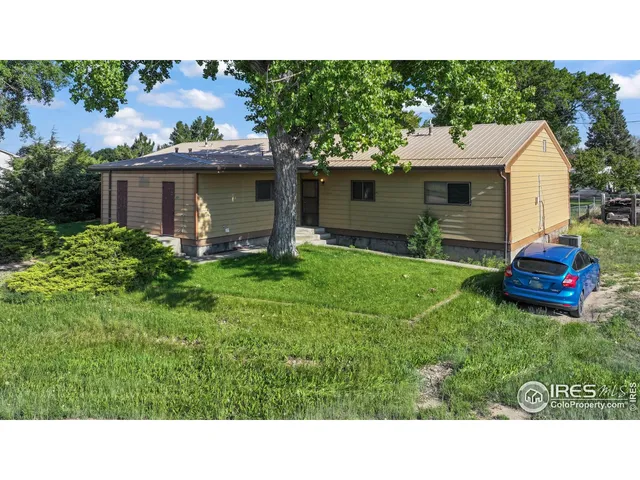 a black and white photo of a house