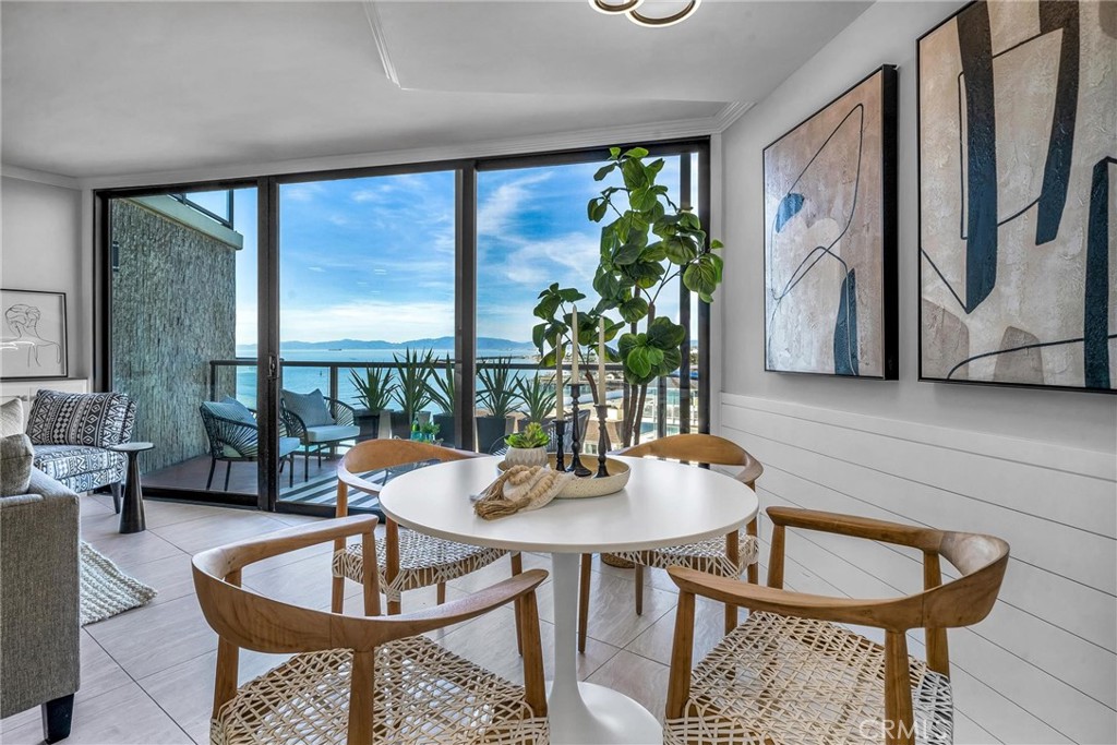 531 Esplanade, Unit 505 Redondo Beach, CA 90277 - Photo 17 of 65 a dining room with furniture and window