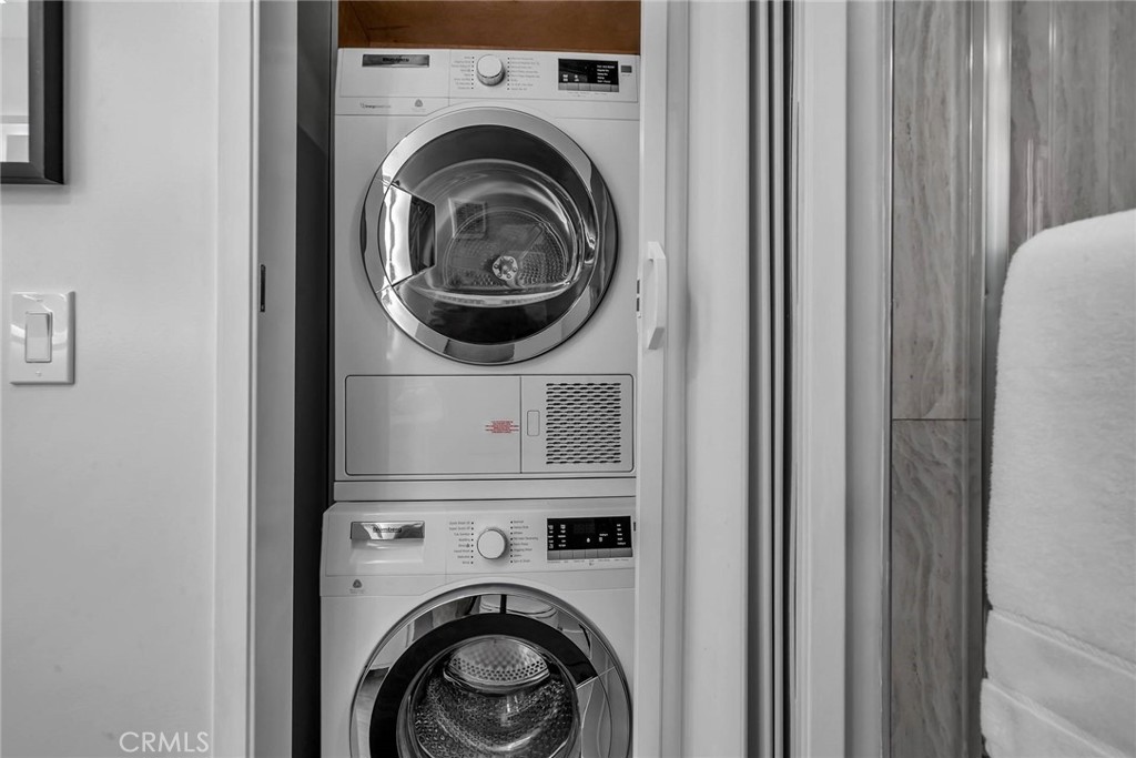 531 Esplanade, Unit 505 Redondo Beach, CA 90277 - Photo 31 of 65 a close view of a utility room with dryer and washer