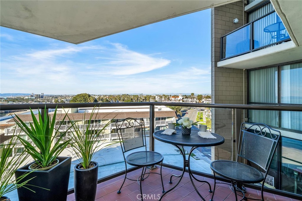 531 Esplanade, Unit 505 Redondo Beach, CA 90277 - Photo 48 of 65 a view of a balcony with furniture and a potted plant