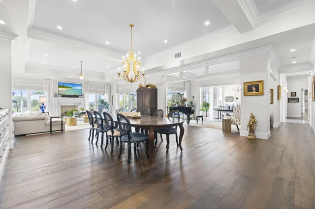 a living room with furniture a rug and a window