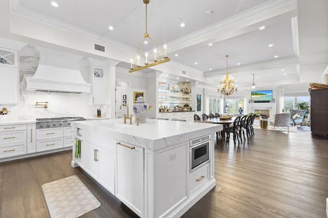a view of a dining room with furniture and a wooden floor