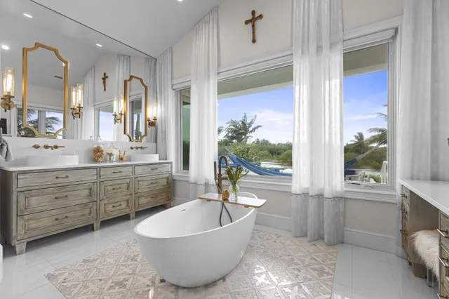 an aerial view of a house with swimming pool and outdoor space