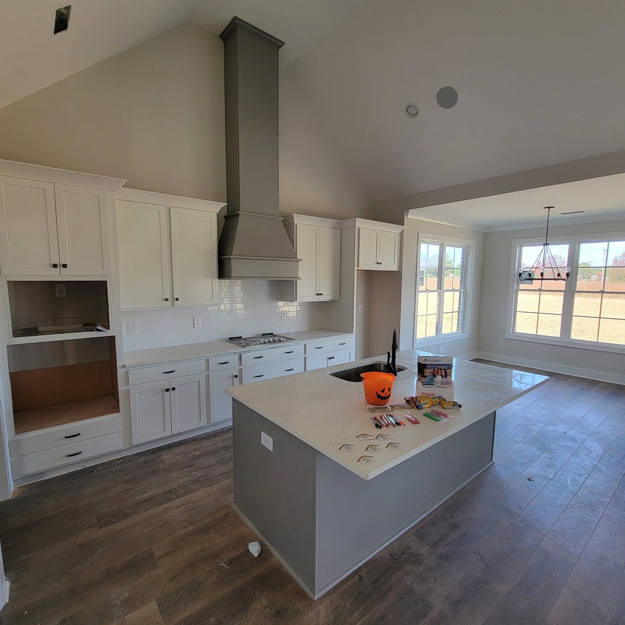 194 Hickory Grove Road Morrison, TN 37357 - Photo 6 of 12 a living room with stainless steel appliances granite countertop a stove top oven a sink dishwasher and white cabinets with wooden floor