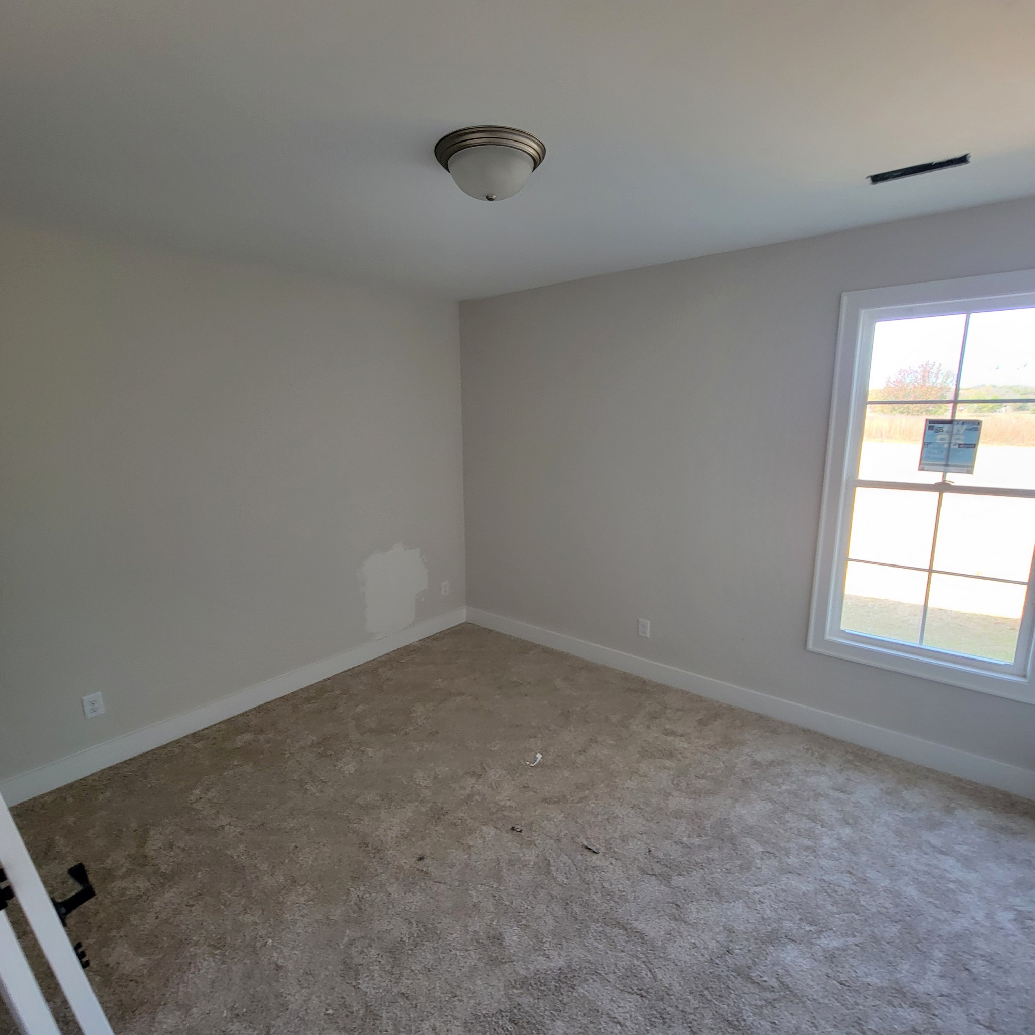 194 Hickory Grove Road Morrison, TN 37357 - Photo 8 of 12 an empty room with a window