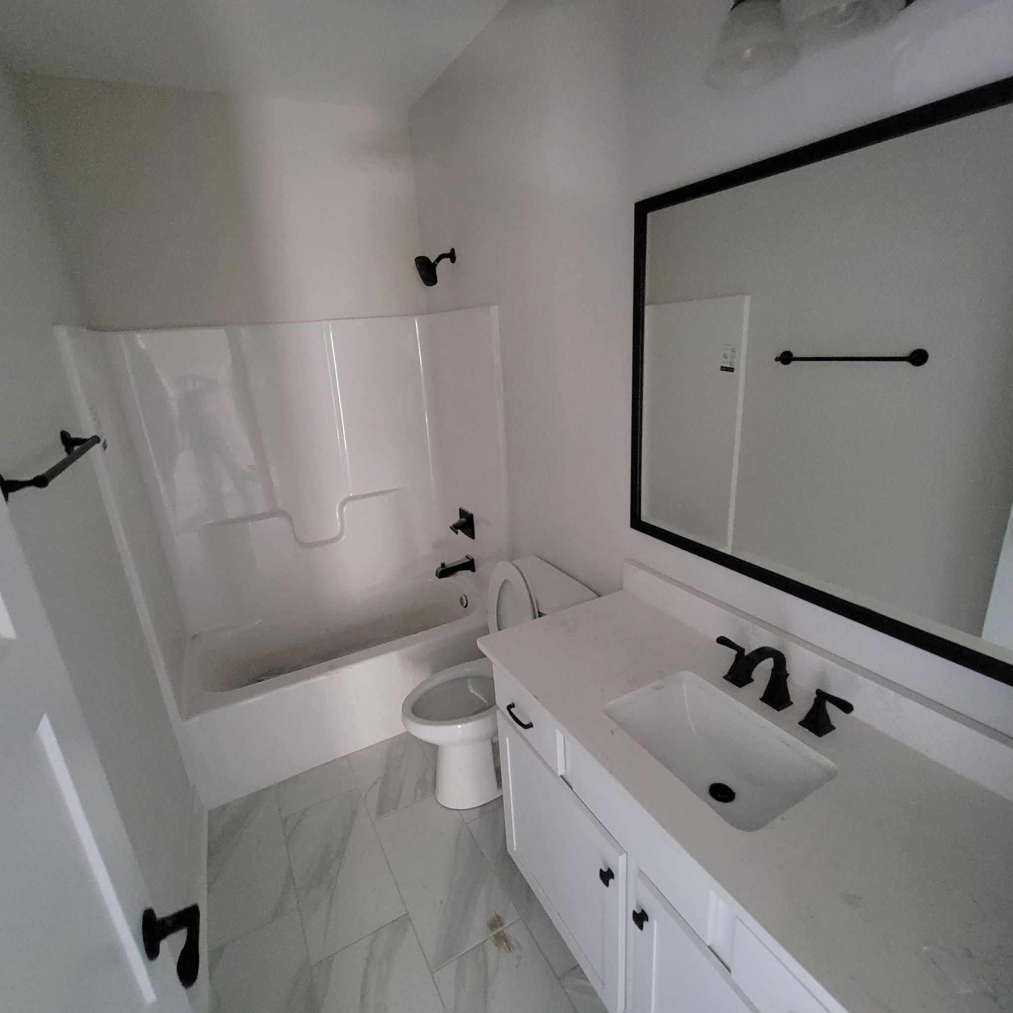194 Hickory Grove Road Morrison, TN 37357 - Photo 9 of 12 a bathroom with a sink and mirror with toilet