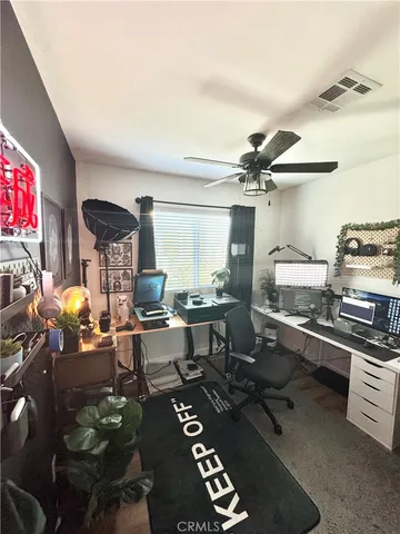 a kitchen with a table and chairs