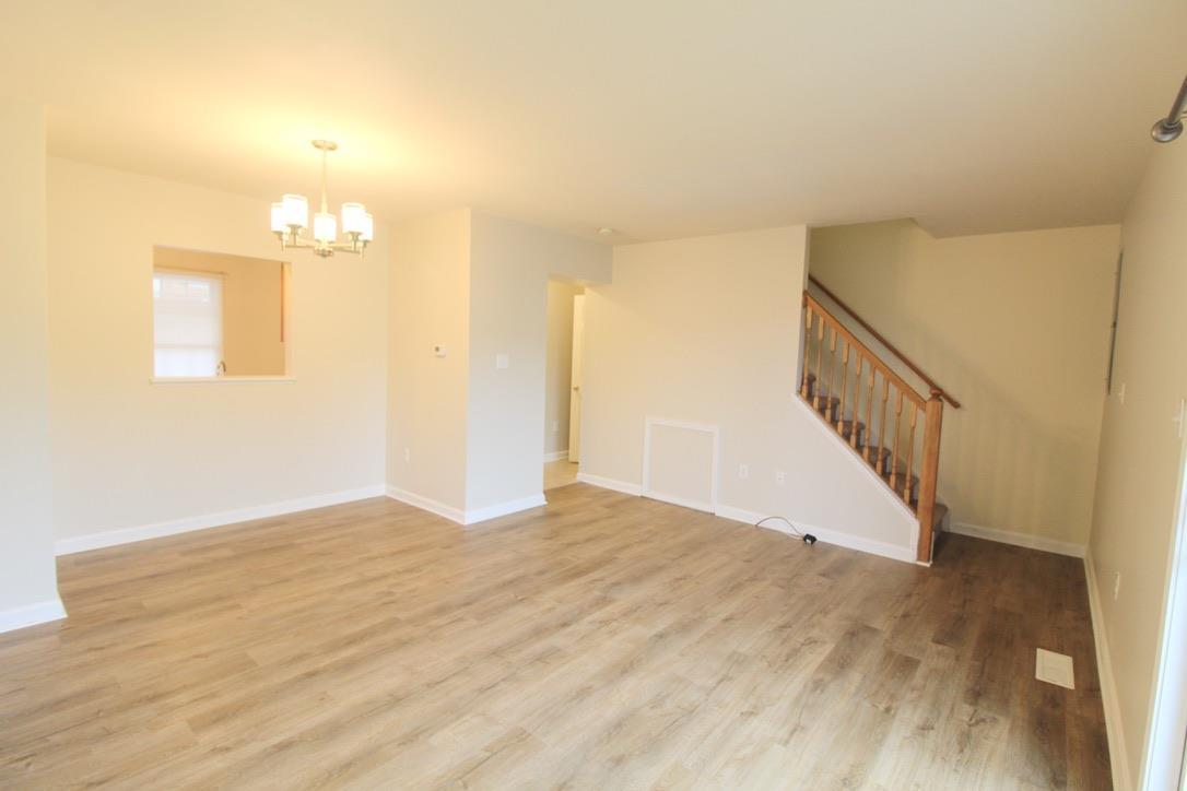 1026 Commercial Court Harrisonburg, VA 22802 - Photo 7 of 16 a view of a room with wooden floor