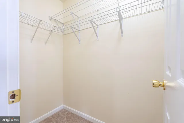 a view of small space with racks on the wall