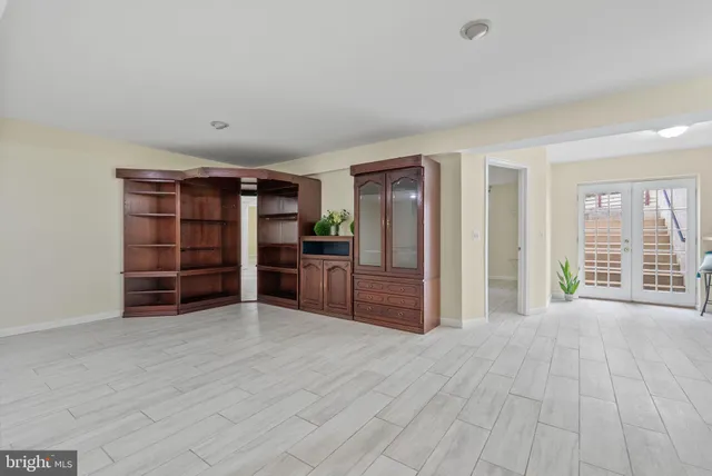 a view of a room with a furniture and closet