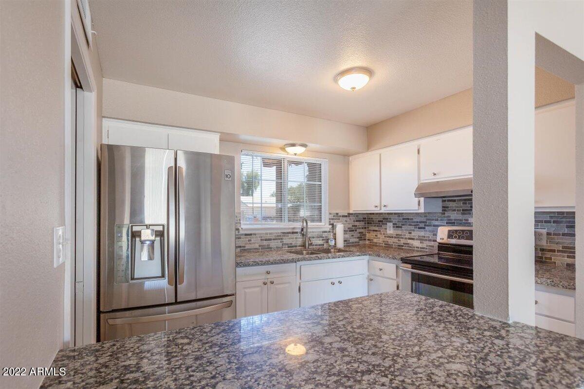 8514 West Piccadilly Road Phoenix, AZ 85037 - Photo 3 of 13 04-8514-W-Piccadilly-Rd-Kari-Dean-4
