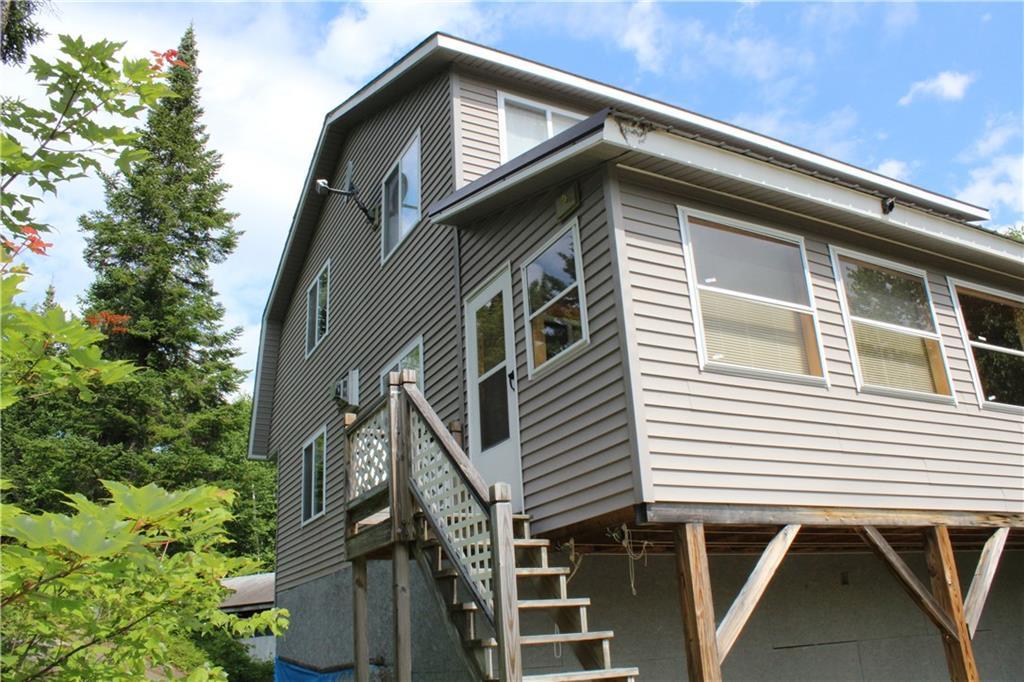 585 Old Spencer Road West Forks, ME 04985 - Photo 31 of 33 Side view of camp. Door leads to...