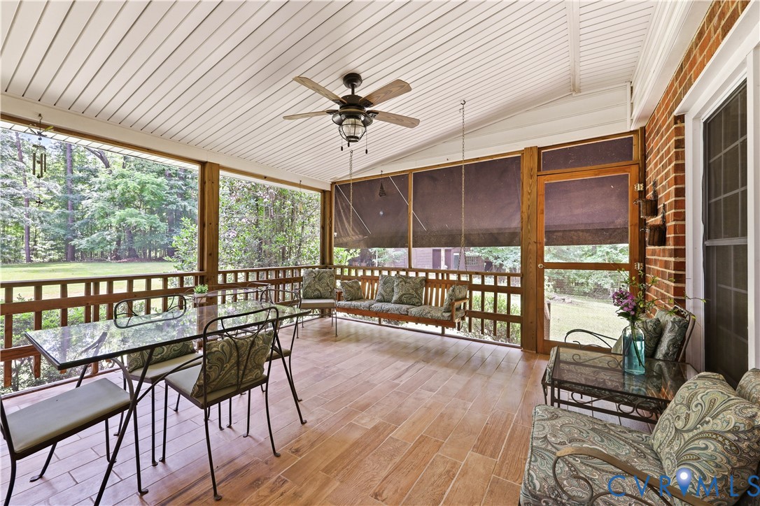 1610 Reams Road Powhatan, VA 23139 - Photo 27 of 41 Screened Porch w retractable awning. Floors are ce