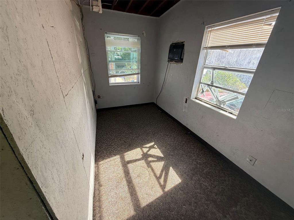 918 Ferndell Road Orlando, FL 32808 - Photo 8 of 8 a view of an empty room and window