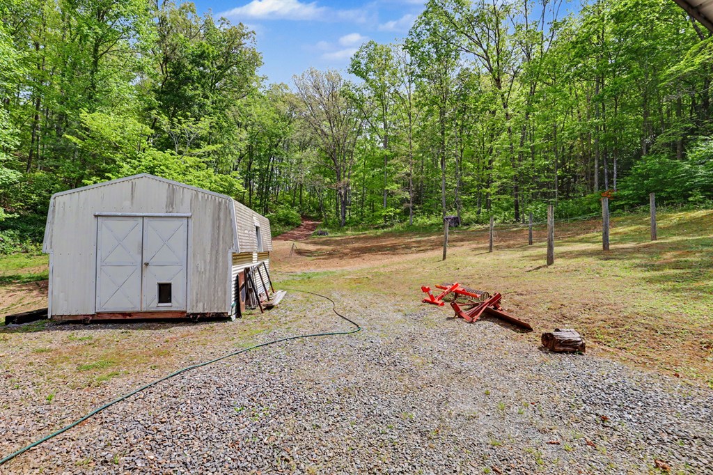 522 Fred Amos Road Murphy, NC 28906 - Photo 15 of 73 a view of a backyard with large trees
