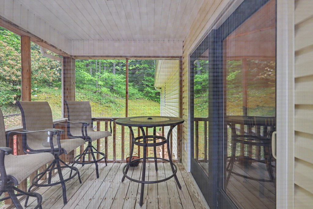 522 Fred Amos Road Murphy, NC 28906 - Photo 19 of 73 a view of a chairs and table in the balcony