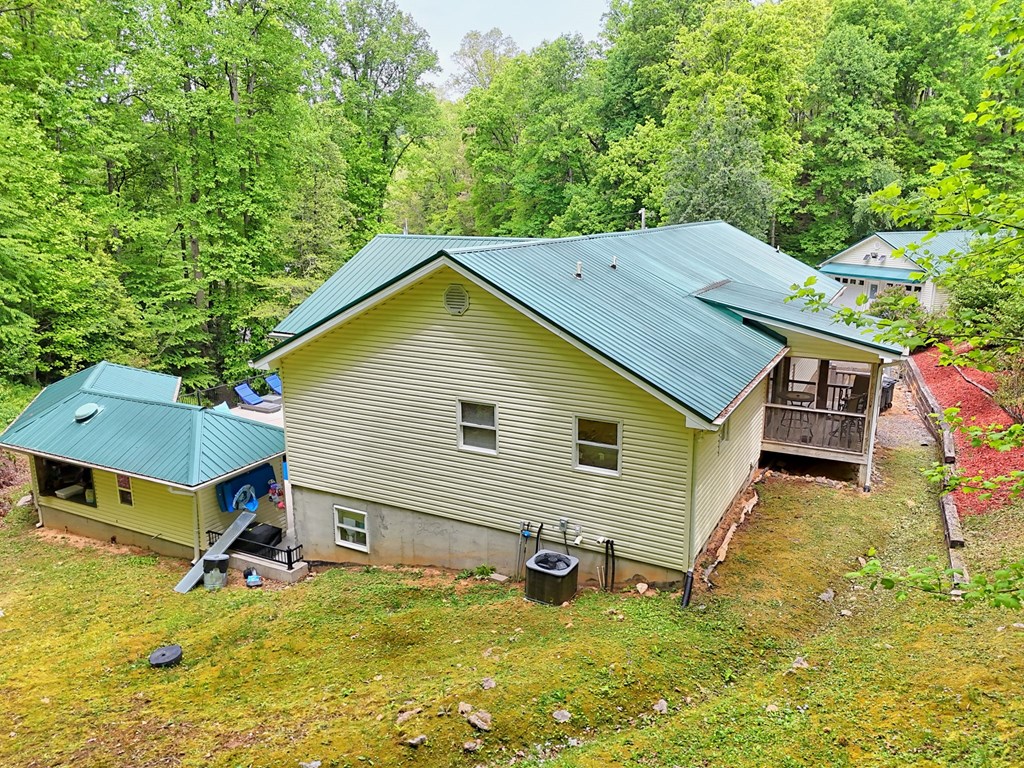 522 Fred Amos Road Murphy, NC 28906 - Photo 22 of 73 a view of a house with a yard balcony and sitting area