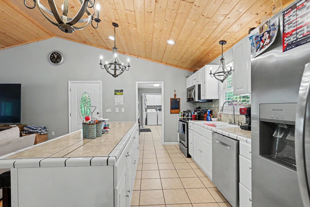 522 Fred Amos Road Murphy, NC 28906 - Photo 41 of 73 a kitchen with a sink cabinets and window