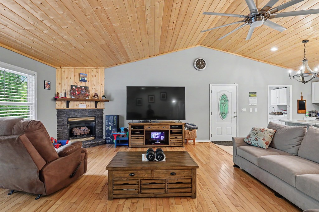 522 Fred Amos Road Murphy, NC 28906 - Photo 43 of 73 a living room with furniture and a flat screen tv