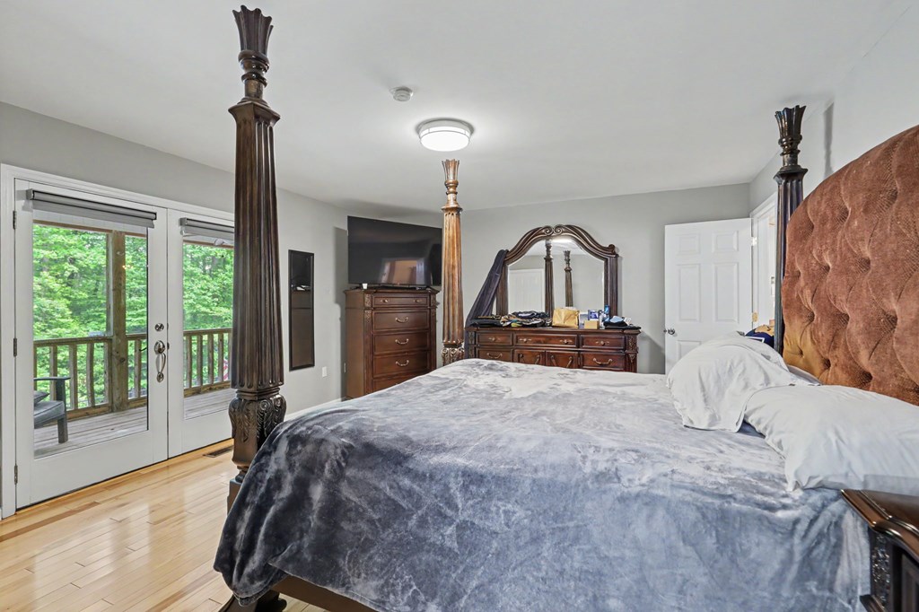 522 Fred Amos Road Murphy, NC 28906 - Photo 53 of 73 a bedroom with a bed next to a window with outer view