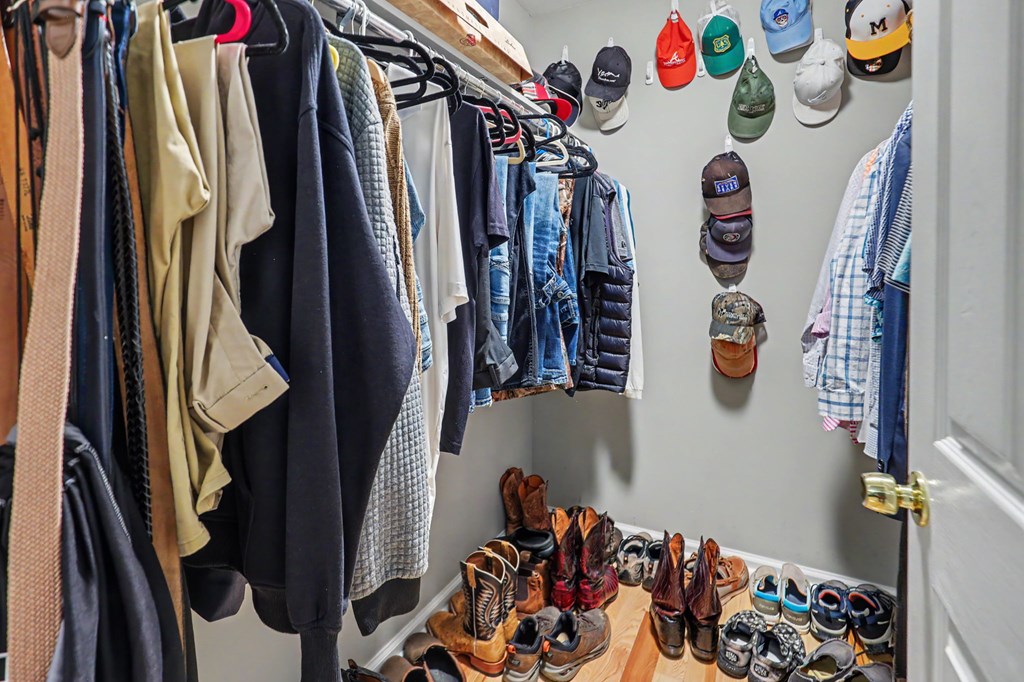 522 Fred Amos Road Murphy, NC 28906 - Photo 54 of 73 a view of walk in closet with clothes and shoes