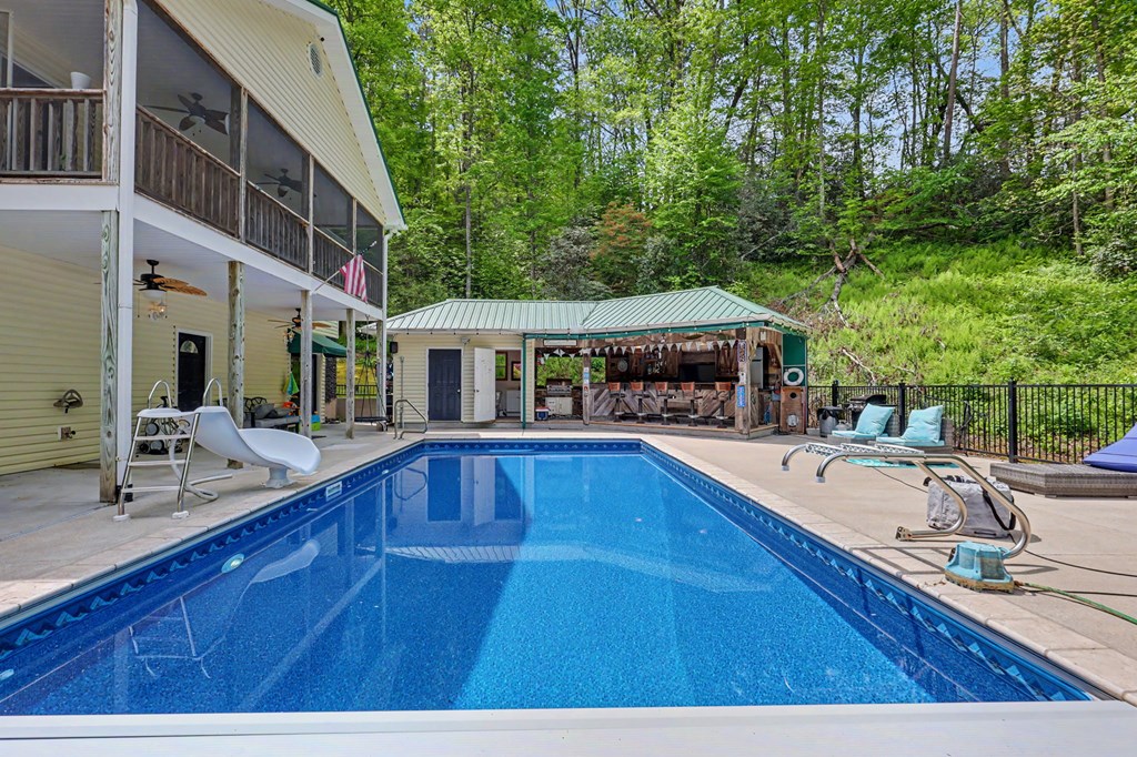 522 Fred Amos Road Murphy, NC 28906 - Photo 10 of 73 a view of a house with pool and chairs