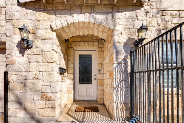 a balcony with a fireplace