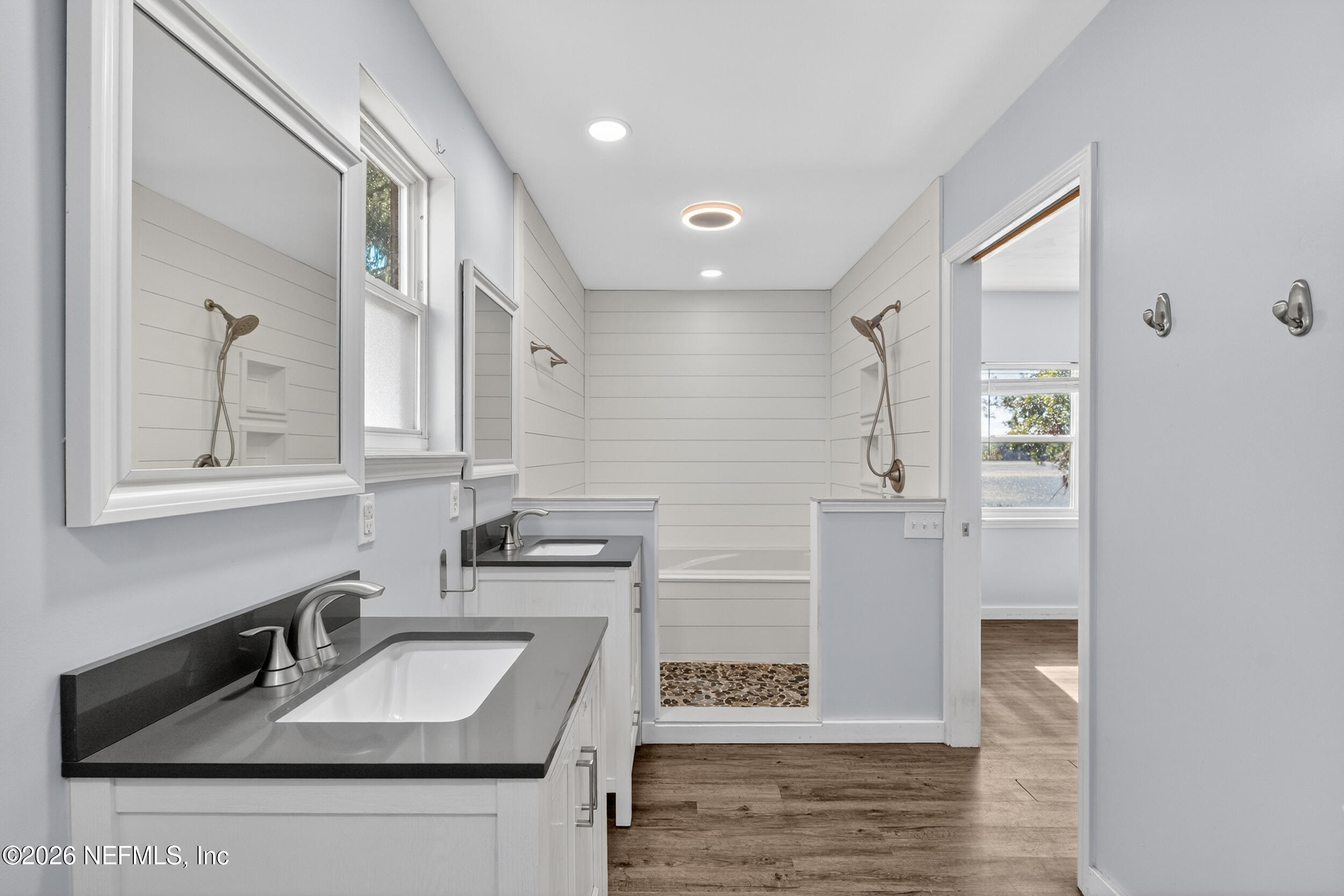 228 Southeast 66th Street Starke, FL 32091 - Photo 15 of 39 a bathroom with a sink and a mirror
