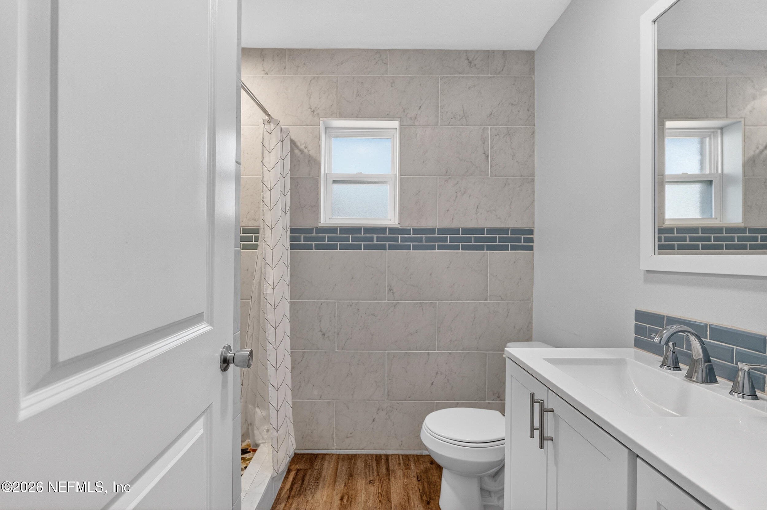 228 Southeast 66th Street Starke, FL 32091 - Photo 24 of 39 a bathroom with a sink a toilet and shower