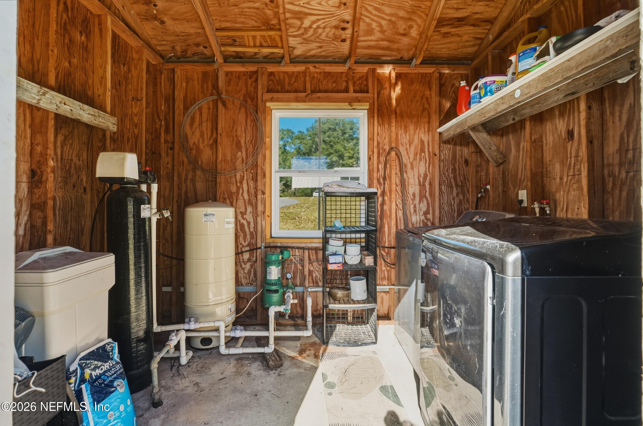 228 Southeast 66th Street Starke, FL 32091 - Photo 26 of 39 a utility room with dryer and washer
