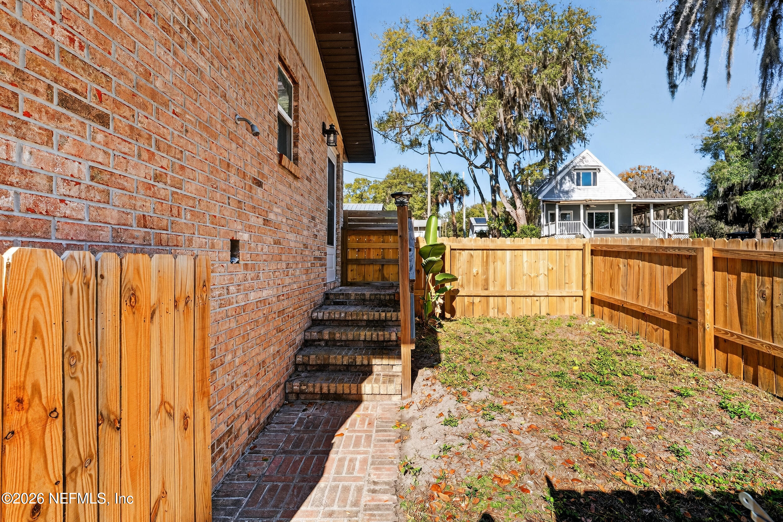 228 Southeast 66th Street Starke, FL 32091 - Photo 27 of 39 a view of a balcony with two chairs