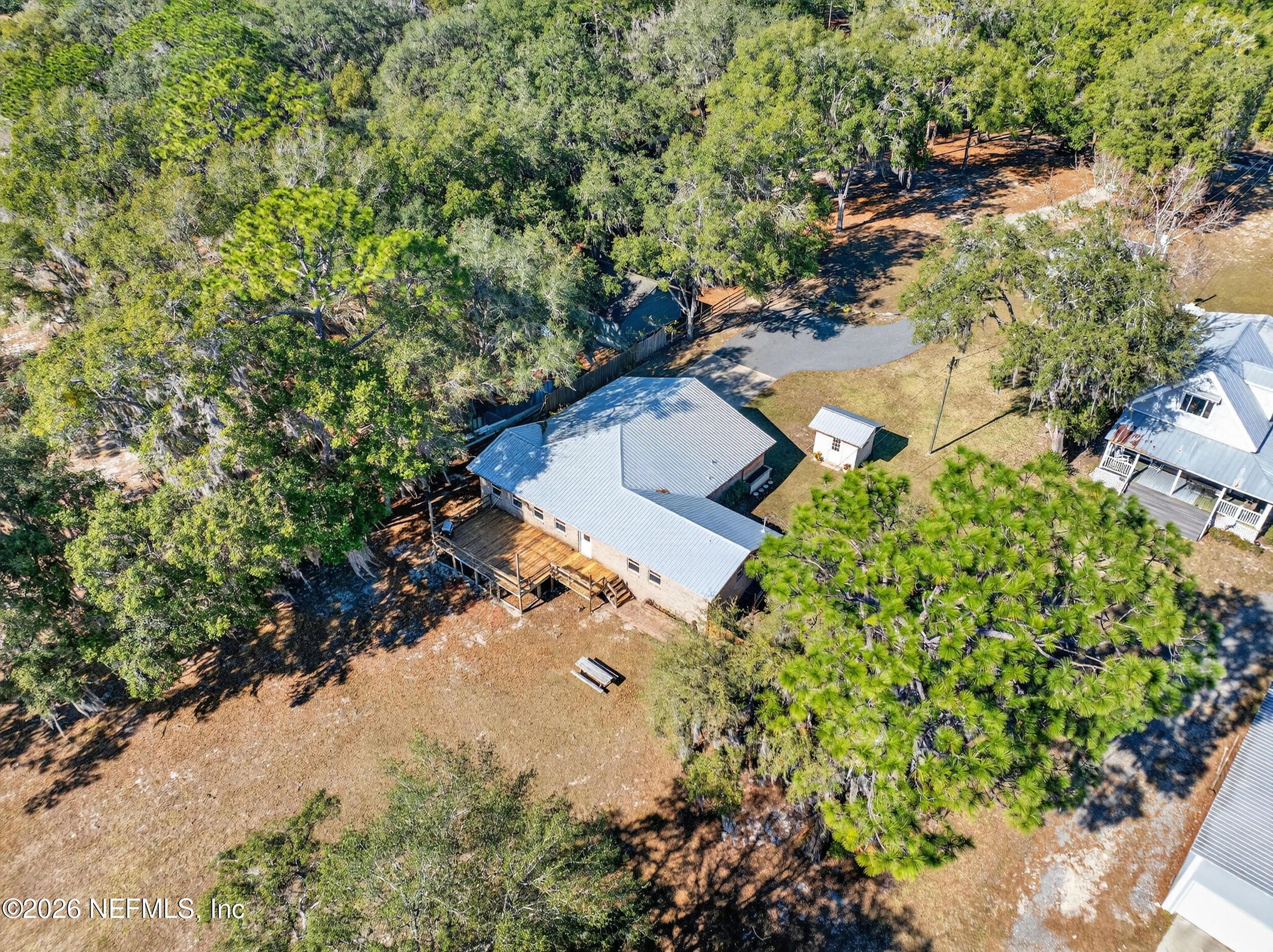 228 Southeast 66th Street Starke, FL 32091 - Photo 34 of 39 an aerial view of a house with a yard and garden