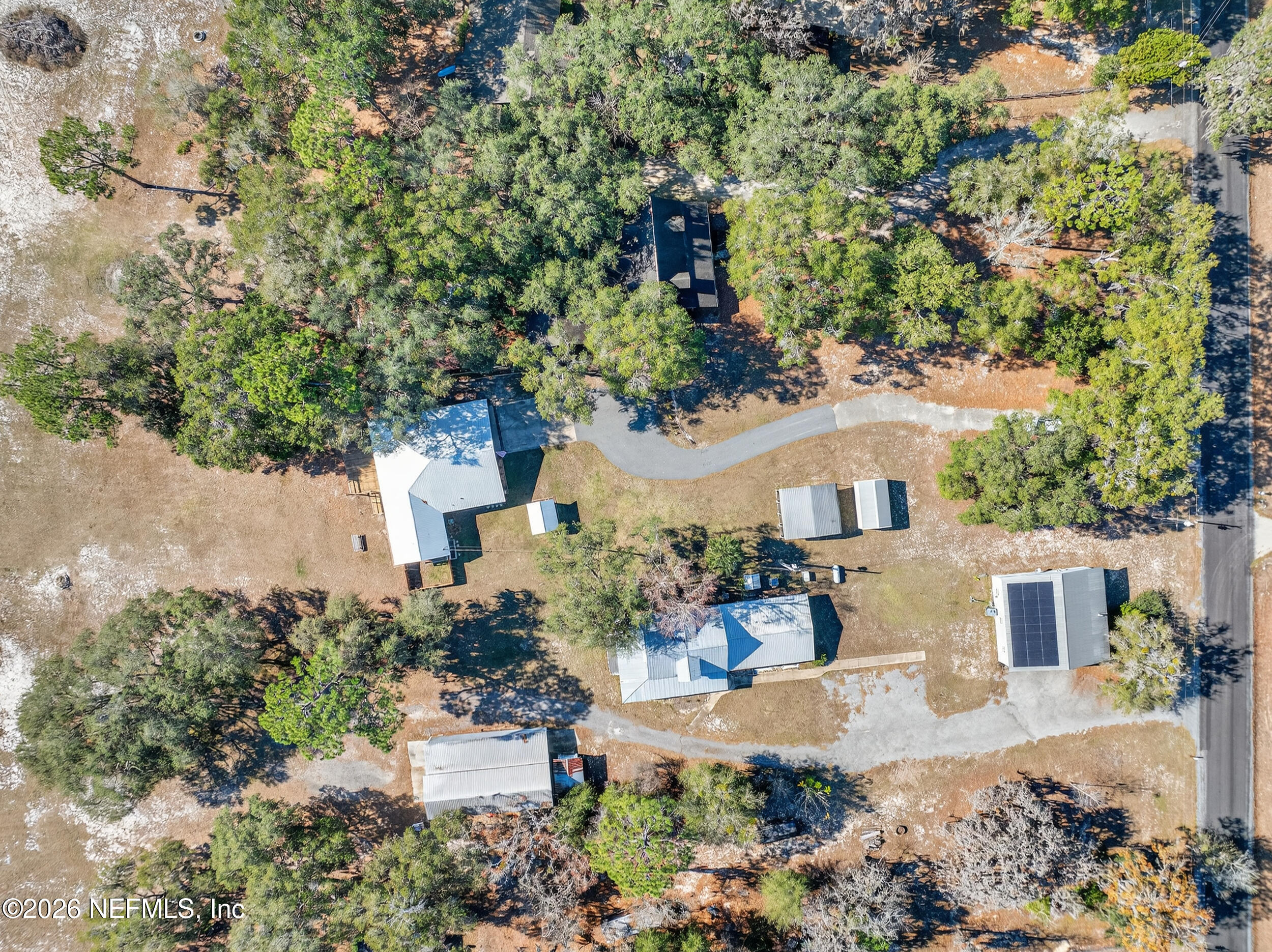 228 Southeast 66th Street Starke, FL 32091 - Photo 36 of 39 an aerial view of a house with a yard