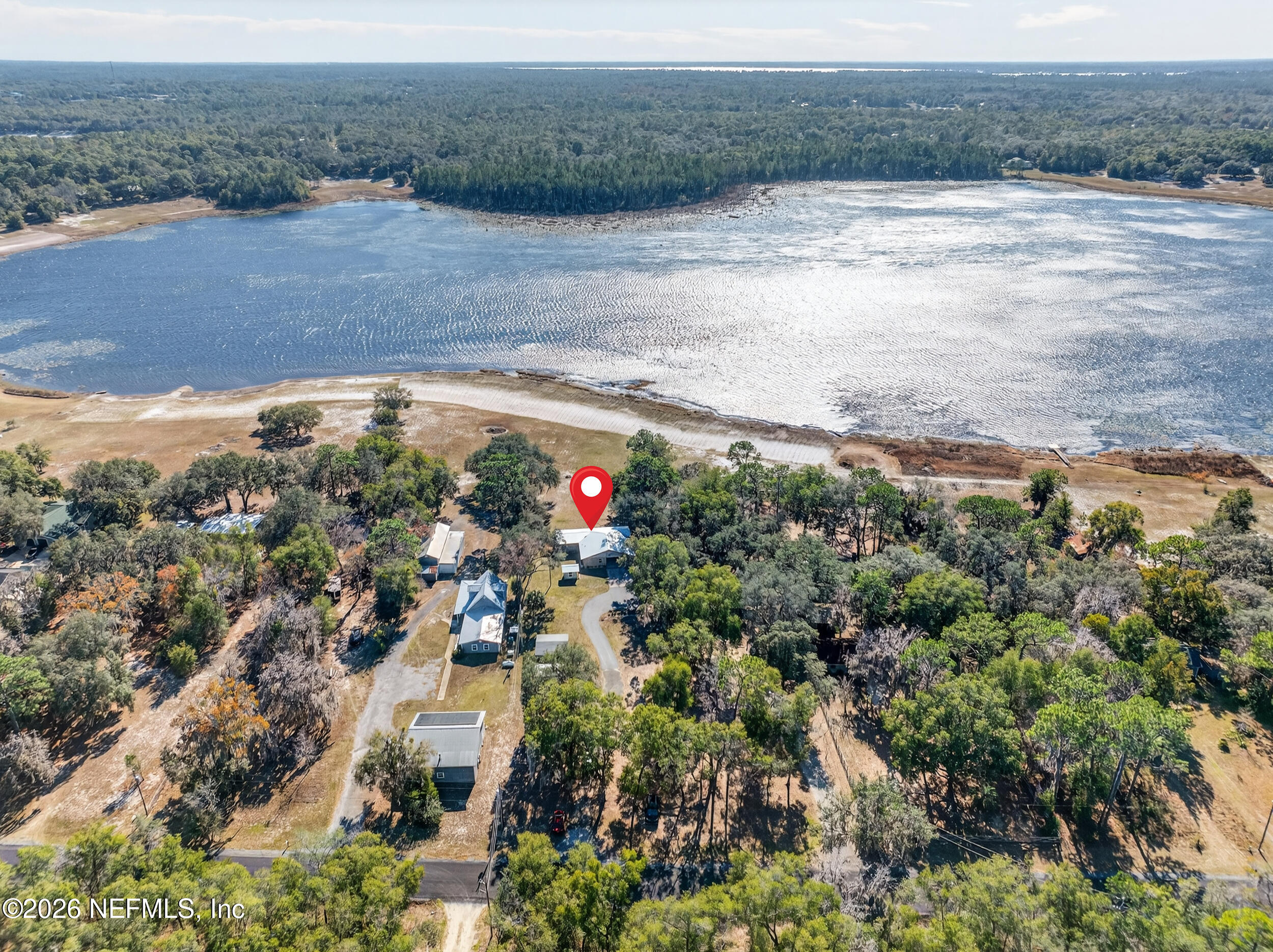 228 Southeast 66th Street Starke, FL 32091 - Photo 38 of 39 a view of a lake with a mountain