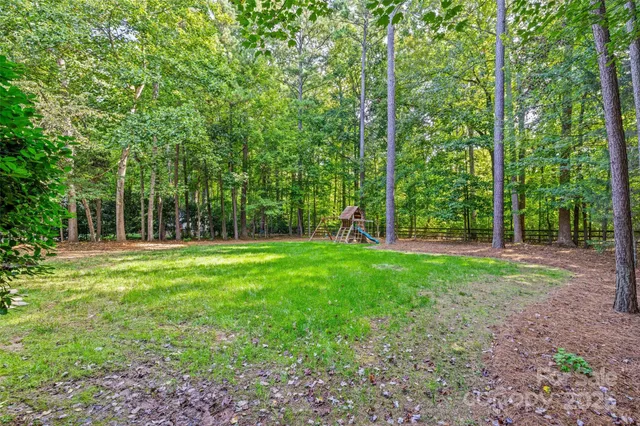 a view of a backyard with a garden
