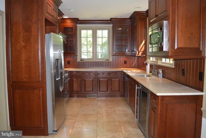 a large kitchen with a sink