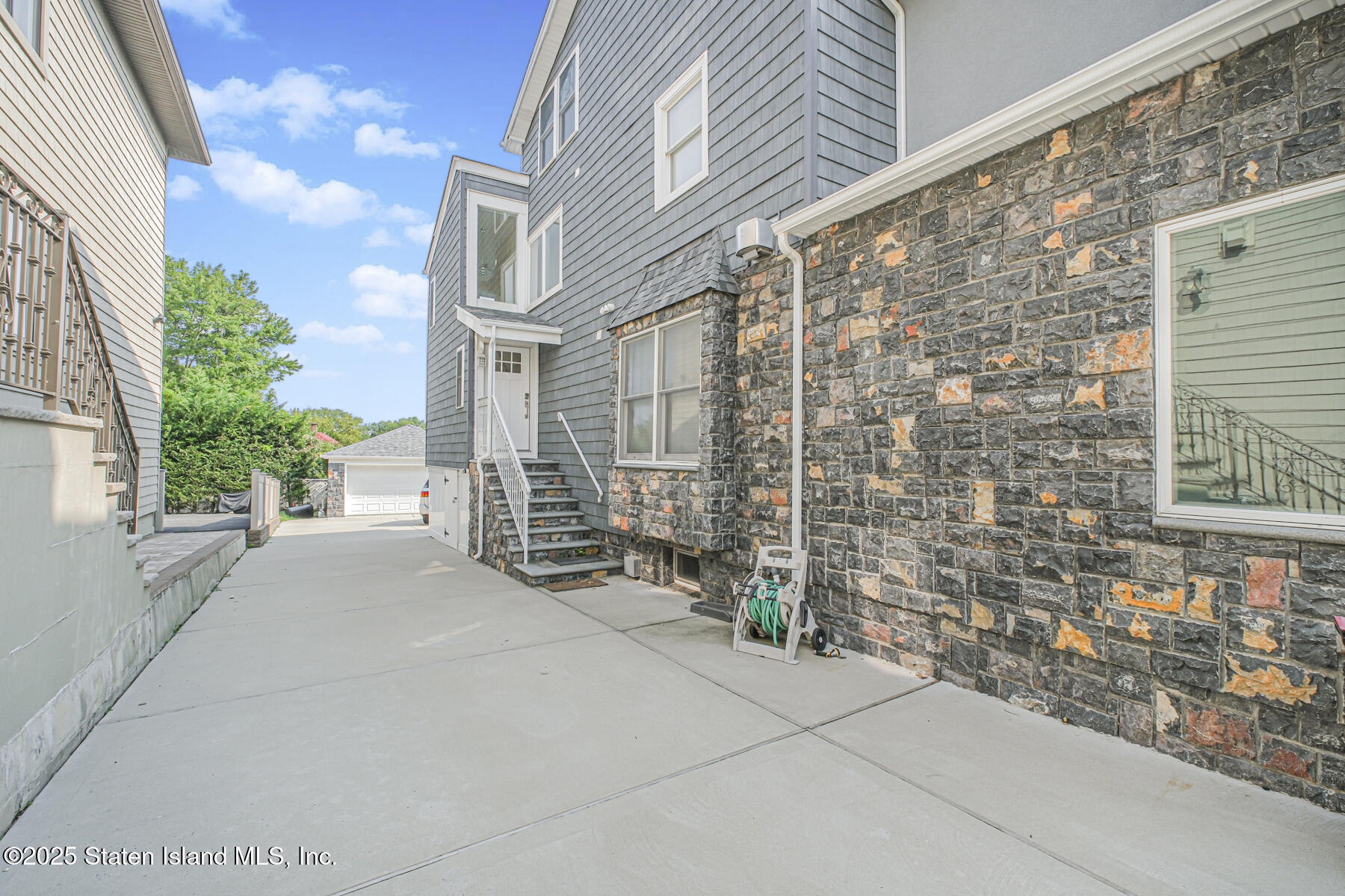 5434 Amboy Road Staten Island, NY 10312 - Photo 15 of 51 a view of a brick house with many windows